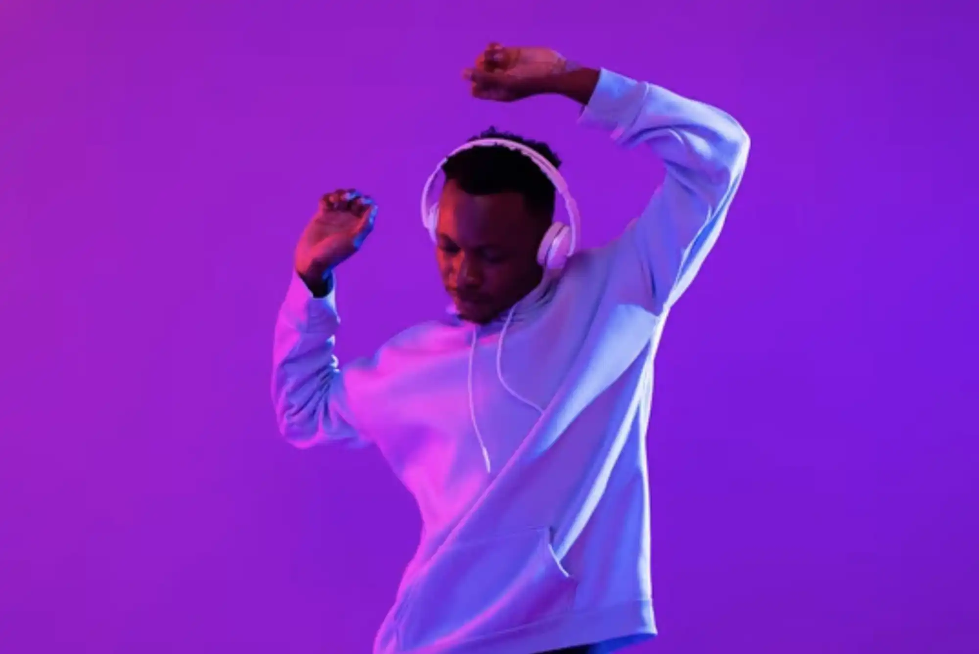 Person dancing listening to music.
